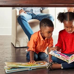 Kids with book | Carpetland USA of VA